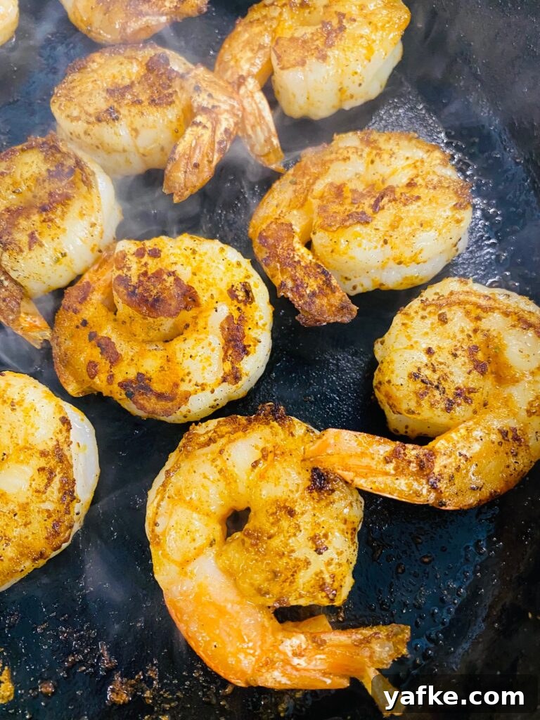 Spicy Buffalo Shrimp over Creamy Cheddar Grits 6 cooked shrimp