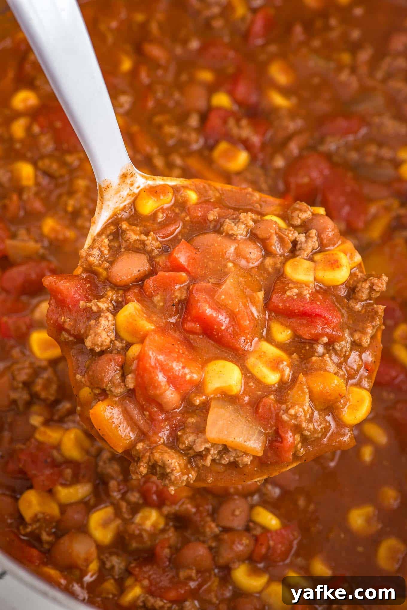 20-Minute Stovetop Chili Recipe for Busy Weeknights 9 Ladle full of 20-minute chili.