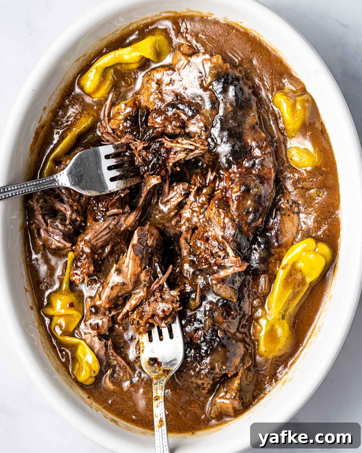 Instant Pot Mississippi Roast with Pepperoncini and Butter 8 Serving bowl of Instant Pot Mississippi Pot Roast.