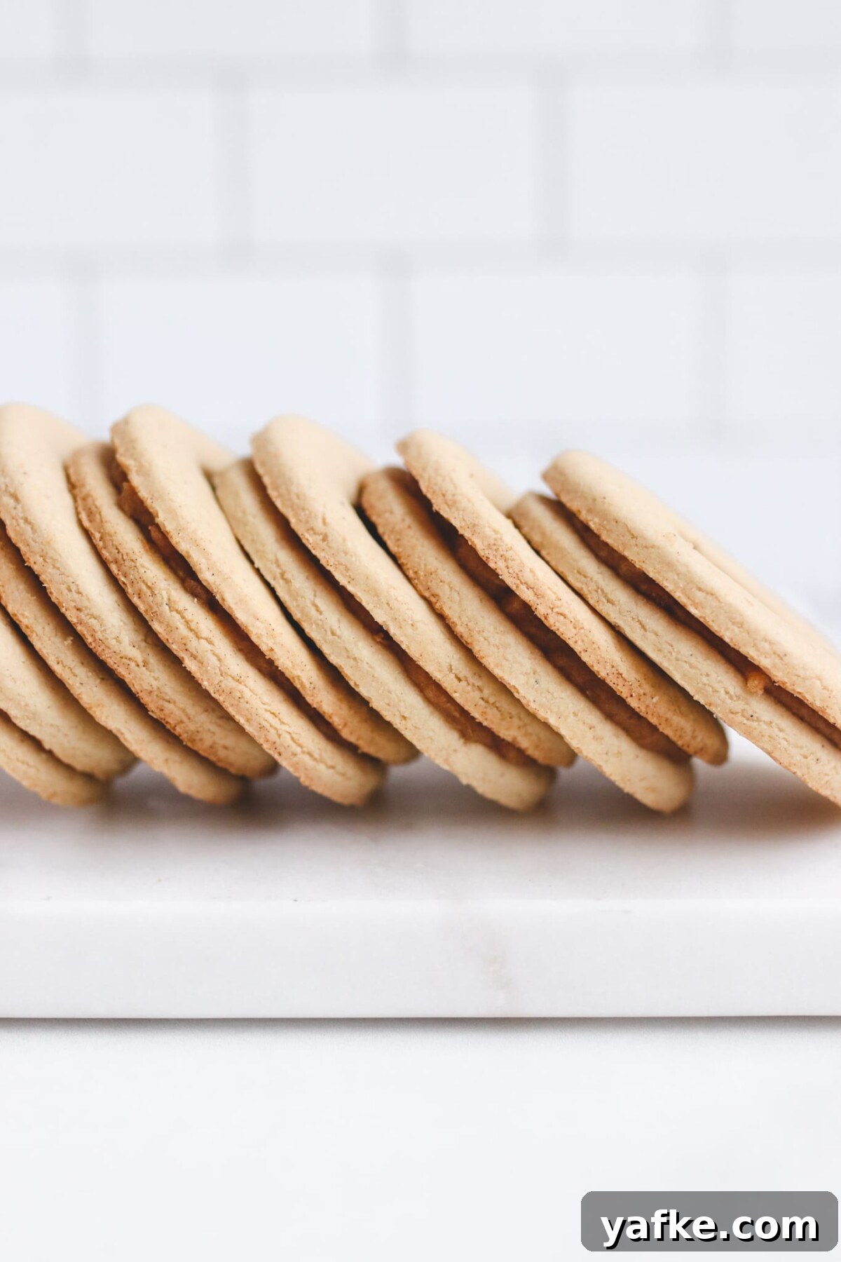 Vegan Gluten-Free Salted Caramel Cookies Recipe 3 shortbread cookies side by side with a white background