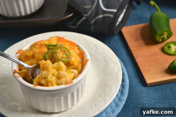 Family enjoying jalapeno butternut mac and cheese Family enjoying mac and cheese