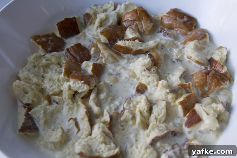 Salted Caramel Pretzel Banana Bread Pudding Recipe 8 Pretzel bread soaking in custard.