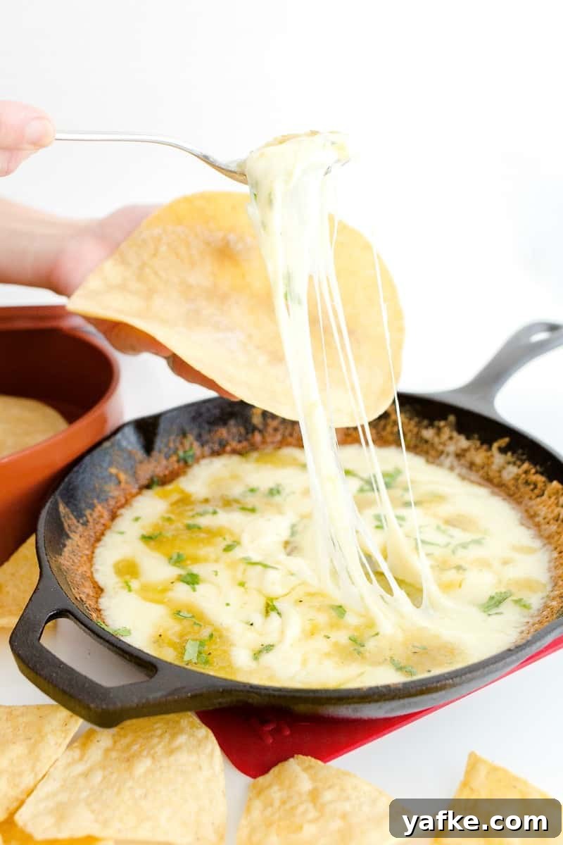 Skillet Queso Fundido: Gooey Melted Cheese Dip Recipe 3 Close-up of melted queso fundido in a skillet