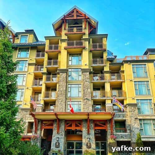 exterior of the pan pacific hotel in whistler village centre in whistler bc canada.