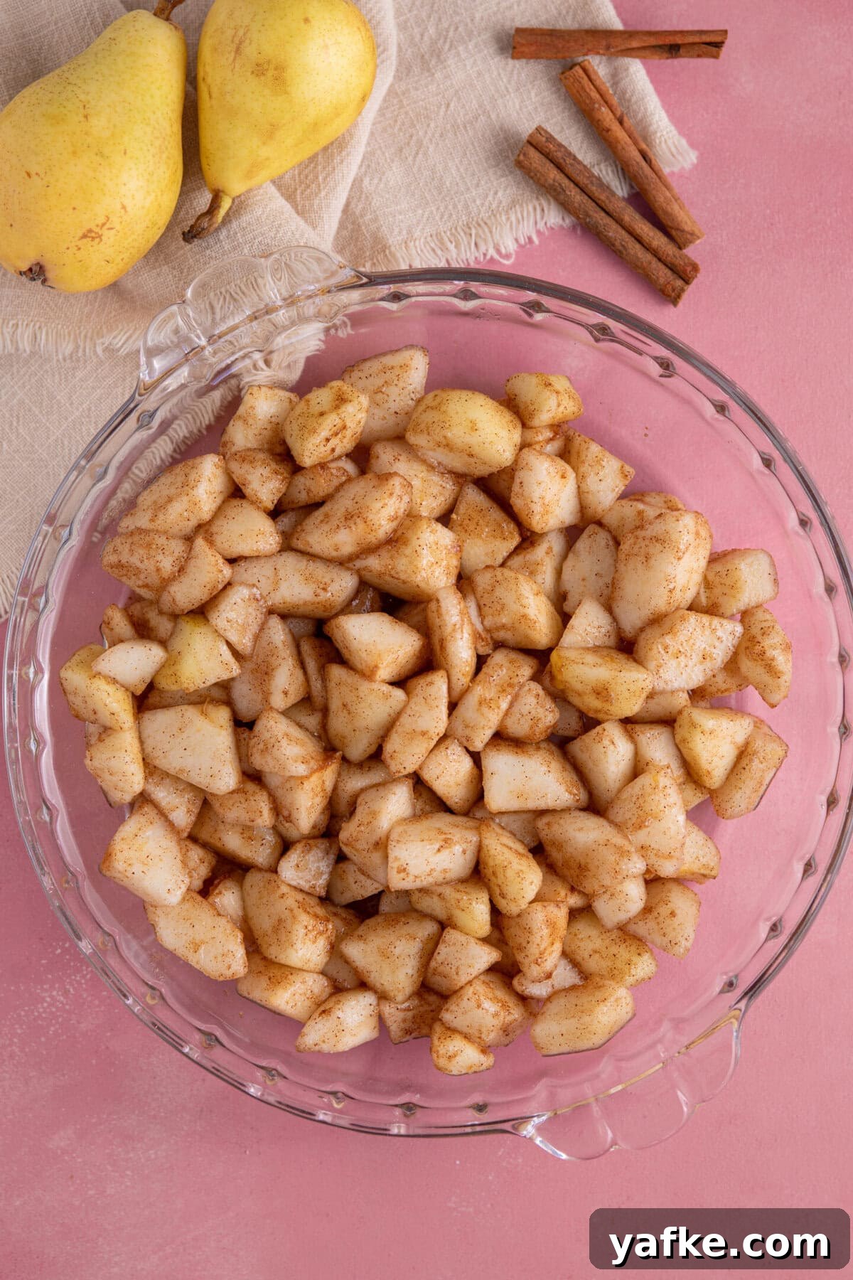 Gluten-Free Pear Crumble Recipe with Cinnamon Streusel 5 Cut up the pears and mix with the brown sugar and spices.