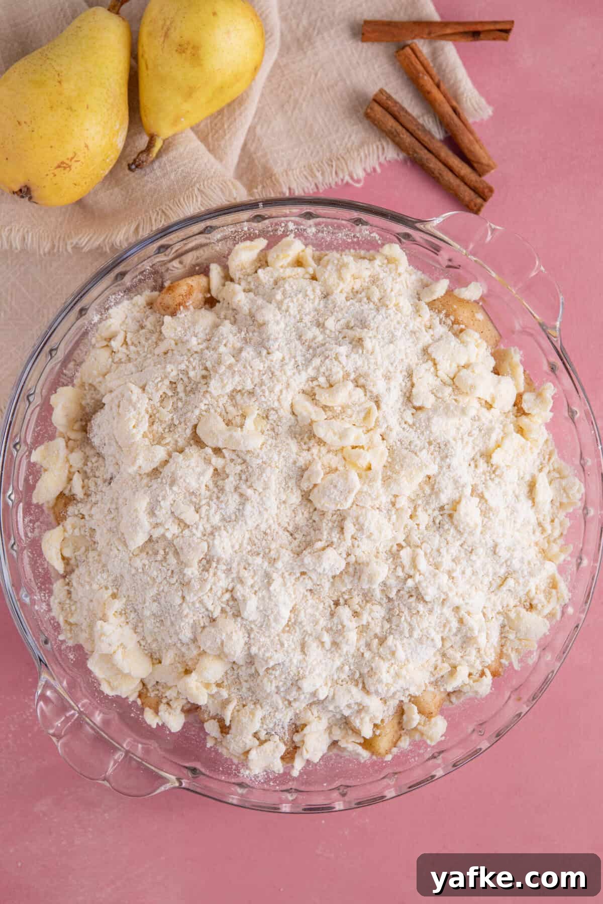 Gluten-Free Pear Crumble Recipe with Cinnamon Streusel 8 Top the pear filling with crumble top and then bake until golden.