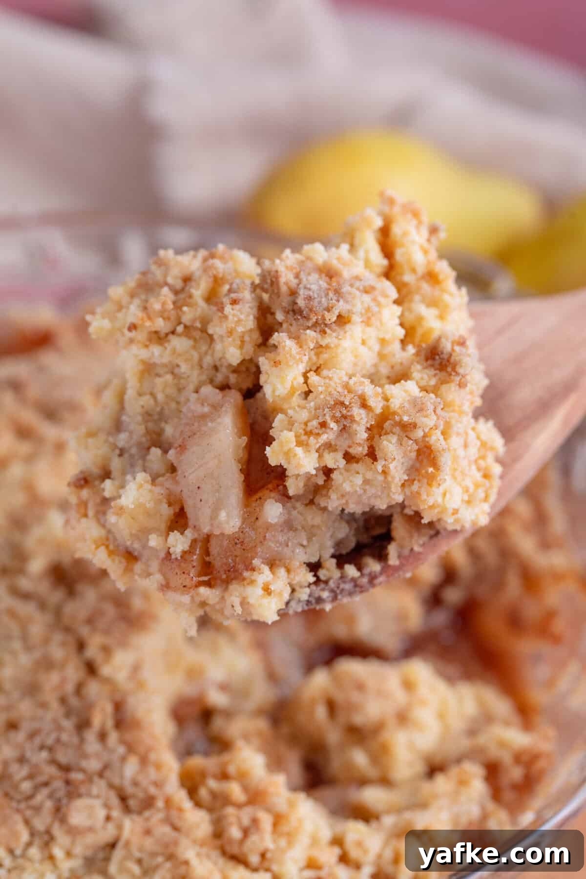 Gluten-Free Pear Crumble Recipe with Cinnamon Streusel 9 A spoonful of gluten free pear crumble.