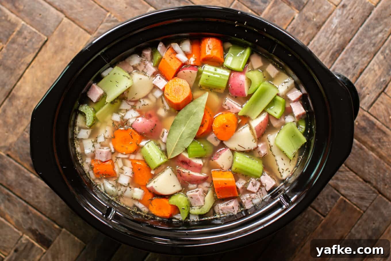 Hearty Slow Cooker Split Pea Stew Recipe 3 uncooked split pea stew in a slow cooker.
