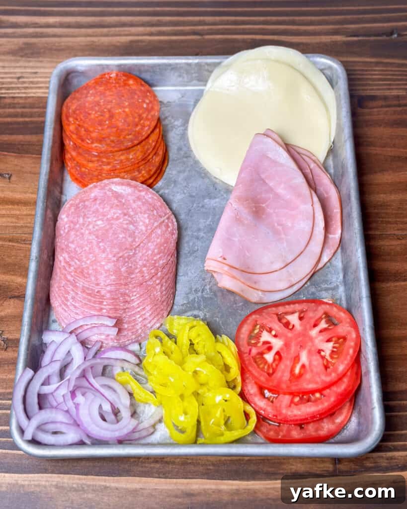 Viral Chopped Italian Sandwich Recipe: How to Make It 3 Meats, cheese and veggies for an Italian sandwich