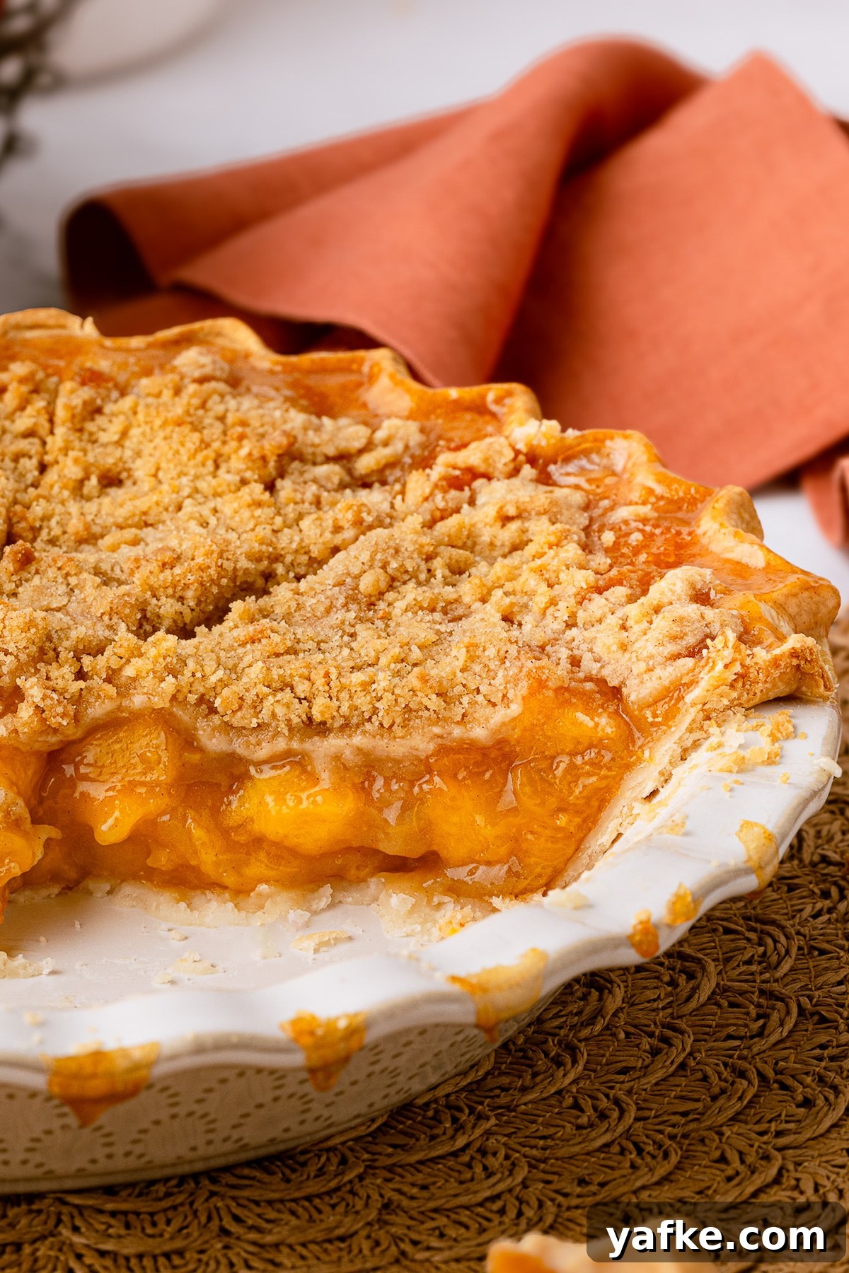 Classic Peach Crumble Pie with Brown Sugar Streusel 11 A deep dish peach pie made with frozen sliced peaches.