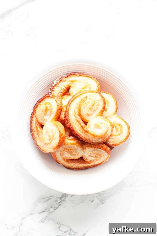 Air Fryer French Palmiers Recipe 5 Palmiers in a white bowl