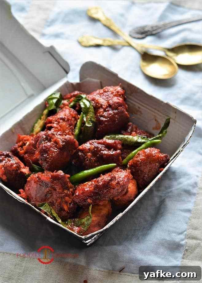 Instant Pot Chicken 65: Spicy South Indian Recipe 3 Indian Chicken 65 recipe cooked in a spicy sauce in Instant Pot by Foodies Terminal.