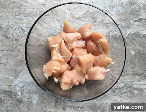 Instant Pot Chicken 65: Spicy South Indian Recipe 4 Chopped chicken pieces in a bowl