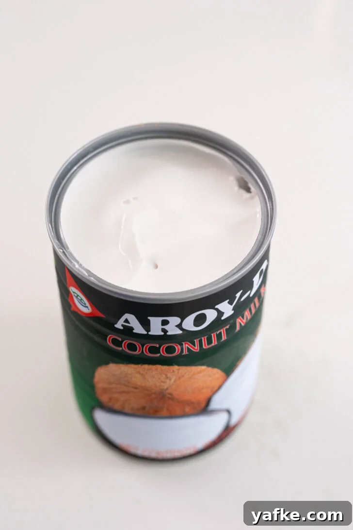 Moist Pina Colada Cake with Caramelized Pineapple 3 A can of coconut milk.