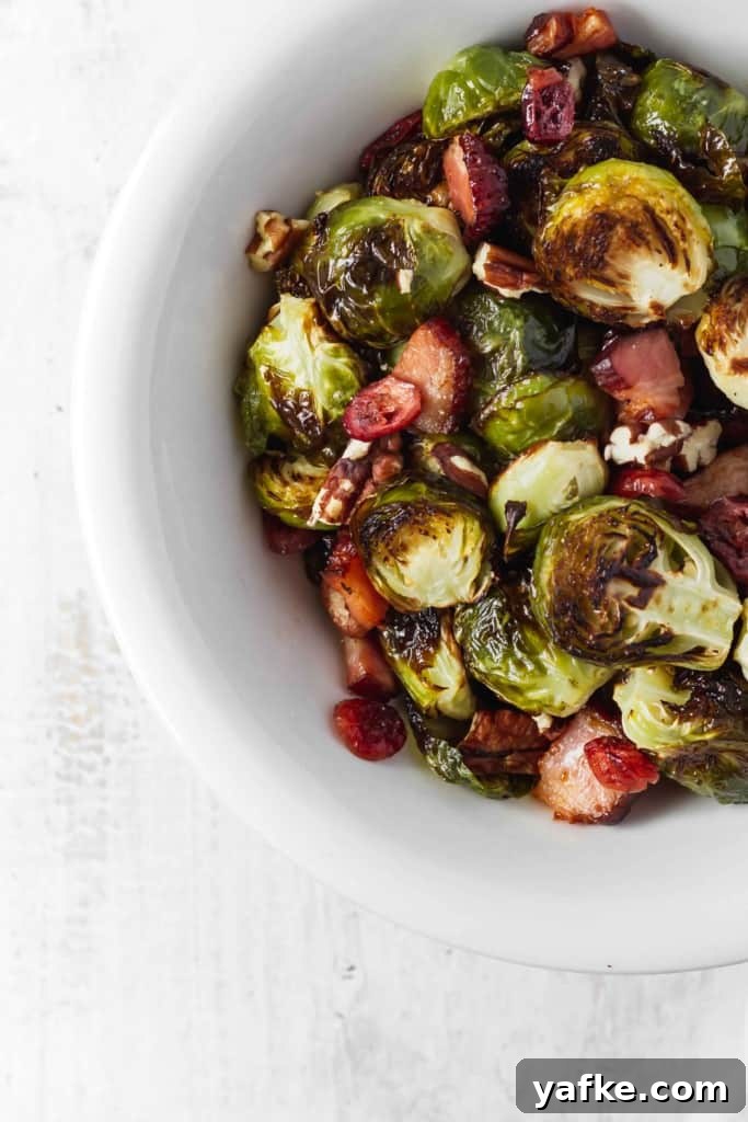 Roasted Brussels Sprouts with Bacon, Cranberries and Pecans 2 Roasted Brussels sprouts with bacon, dried cranberries, and pecans