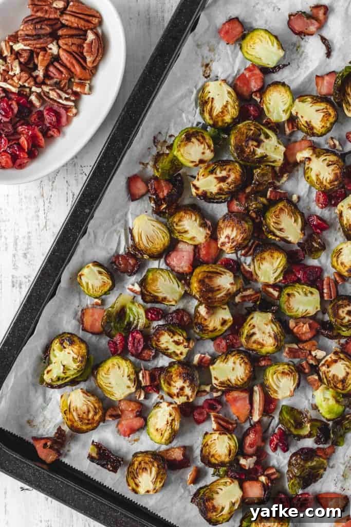 Roasted Brussels Sprouts with Bacon, Cranberries and Pecans 3 Oven-roasted brussels sprouts with crispy bacon