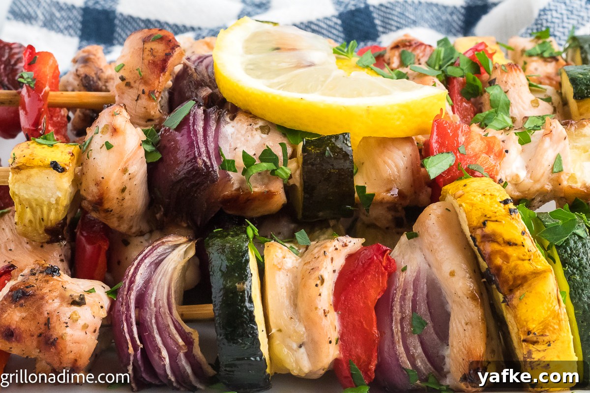 Low-Carb Chicken Recipes for Your Blackstone Griddle 2 Chicken kabobs topped with a slice lemon