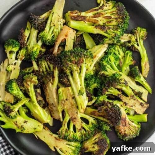 Low-Carb Chicken Recipes for Your Blackstone Griddle 19 Roasted Broccoli on a plate.
