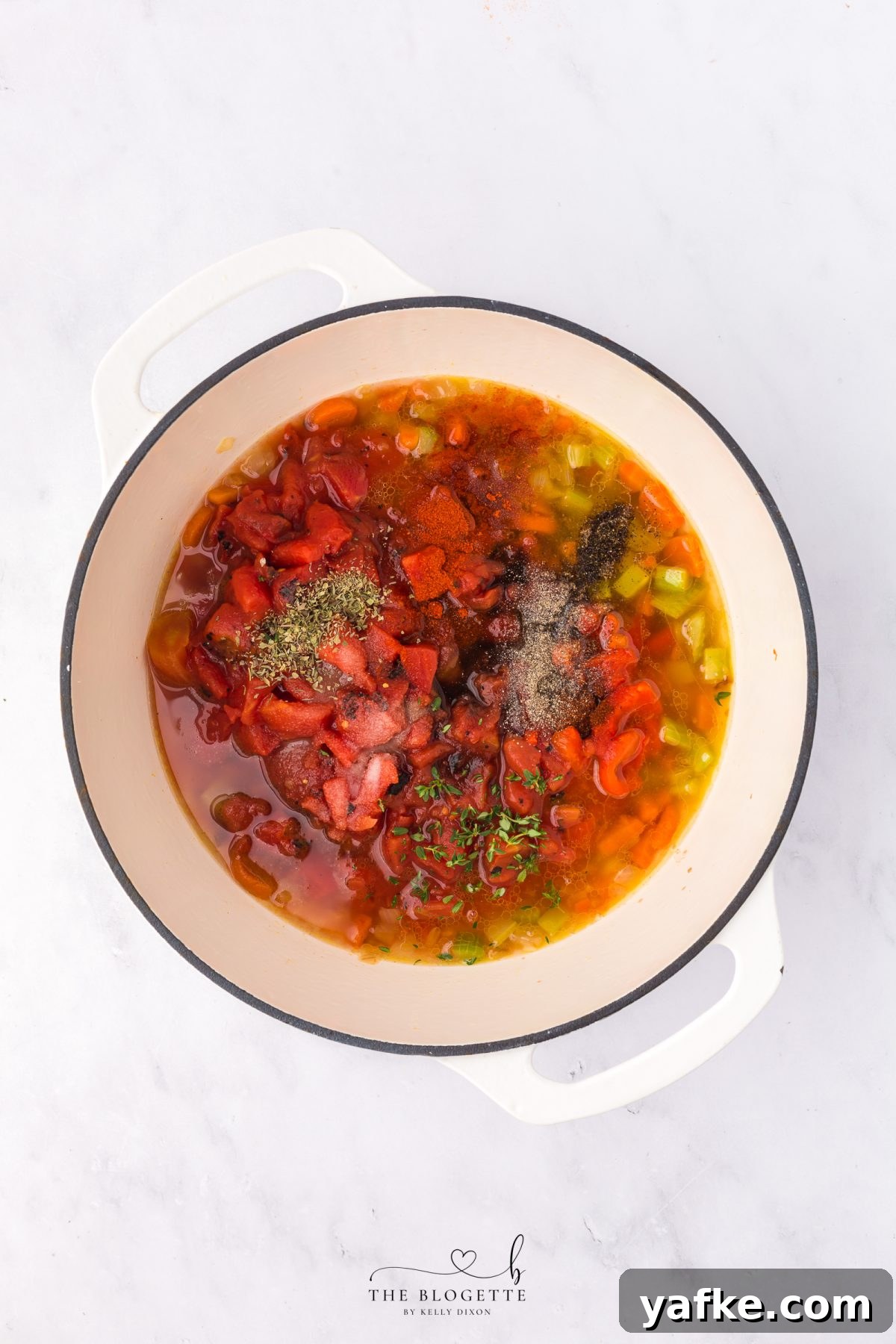 Homemade Creamy Tomato Bisque Recipe 6 Add tomatoes and seasoning