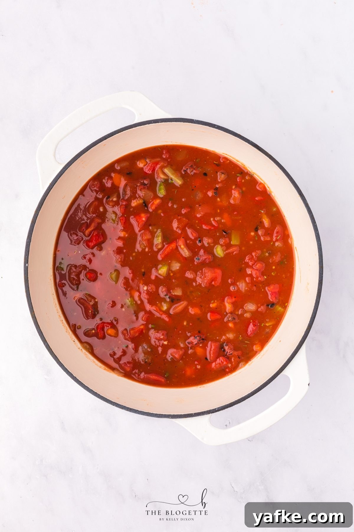 Homemade Creamy Tomato Bisque Recipe 7 Add tomatoes and seasoning