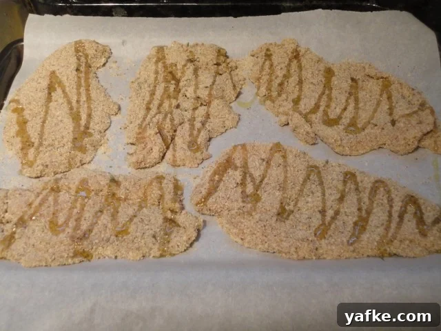 Breaded chicken cutlets drizzled with olive oil