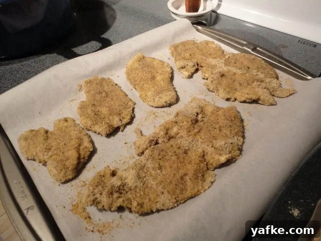 Half baked chicken cutlets after nine minutes in the oven
