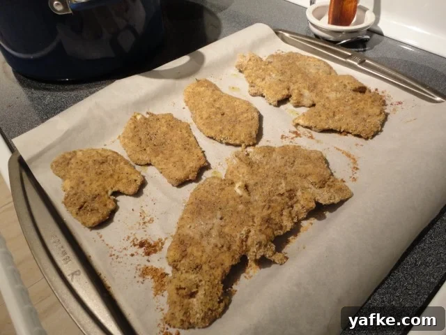 Fully cooked baked breaded chicken cutlets fresh from the oven